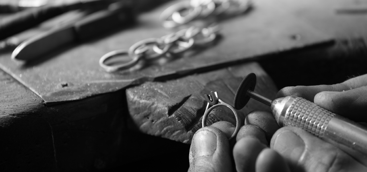 Jeweller making finishing touches to a ring